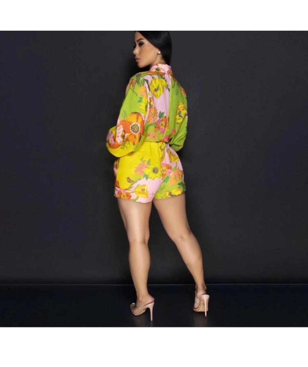 Thia Turn heads with the Linen Floral Printed Shawl Collar Bandage Rompers
